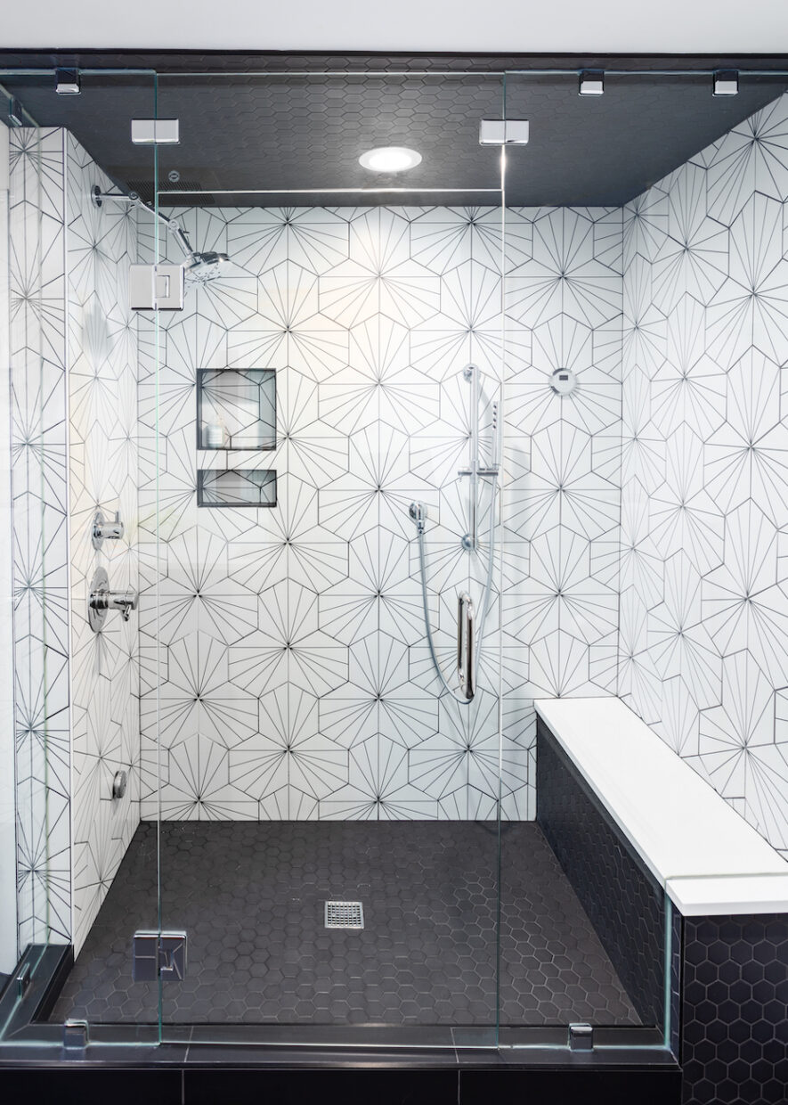 black-and-white-shower-tile-bench-seat-glass-shower-door