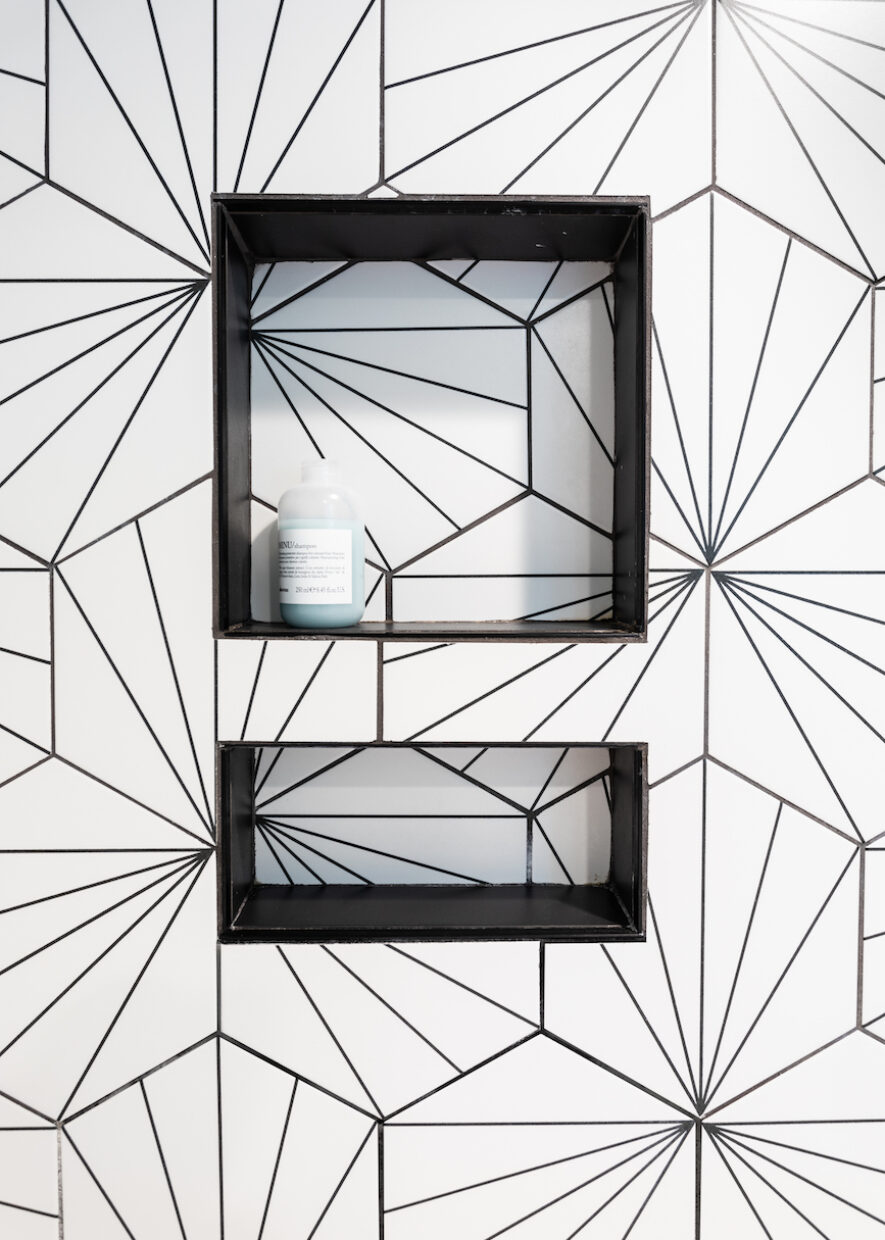 geometric-shower-tile-shelf-black-and-white